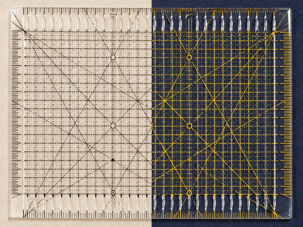 Dual-color sight lines read clearly on any fabric — light batiks, dark solids, and everything between.